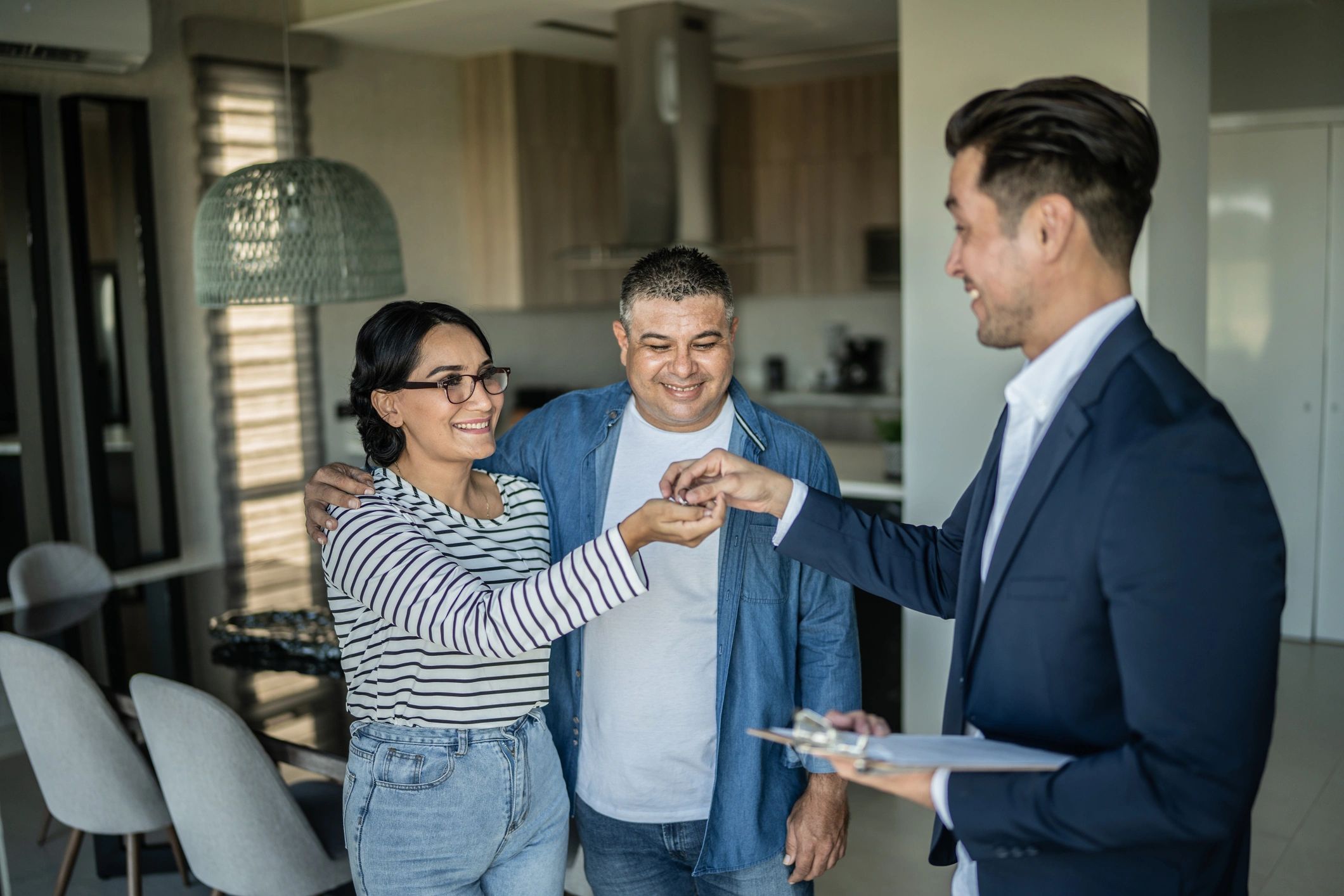 Client receiving keys to a new home
