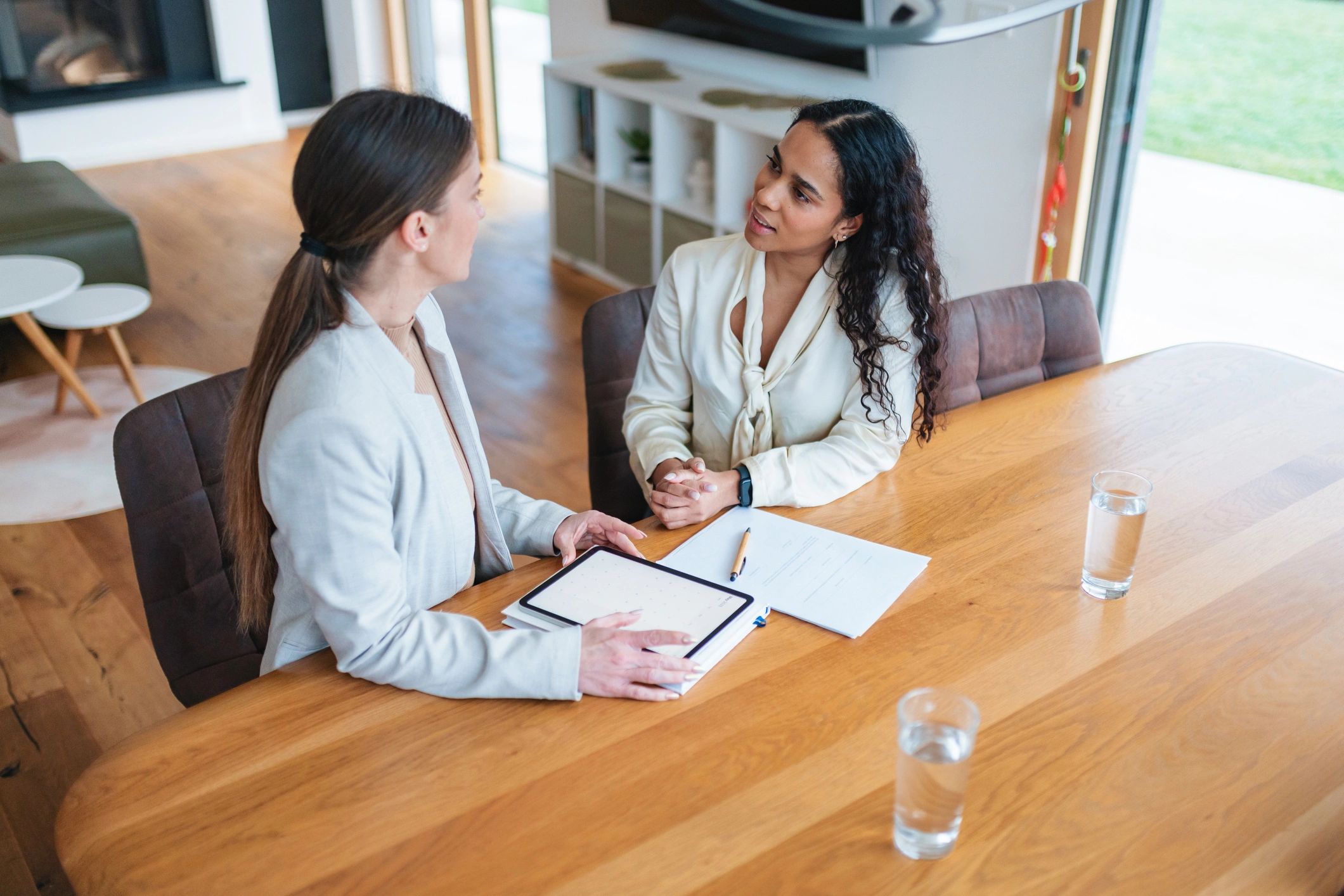Professional consultation between advisor and client in a home setting